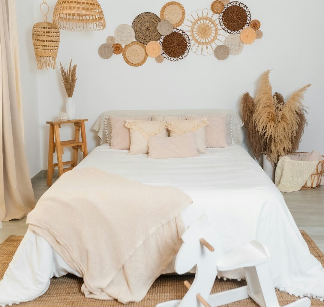 a bedroom with a bed and a rocking chair