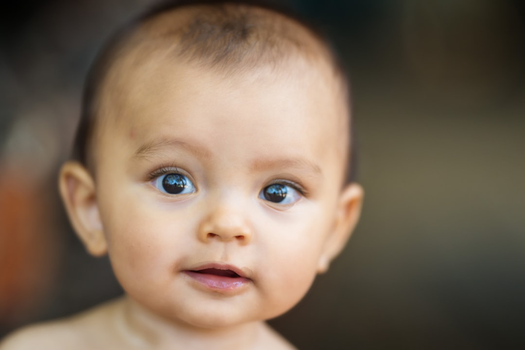 Close-up of a baby's face with wide eyes